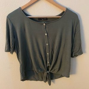 Button up shirt with knot.